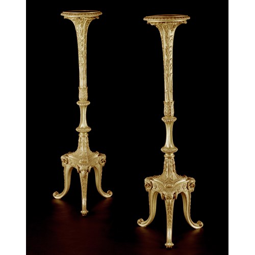 A PAIR OF GEORGE III GILTWOOD TORCHÉRES 